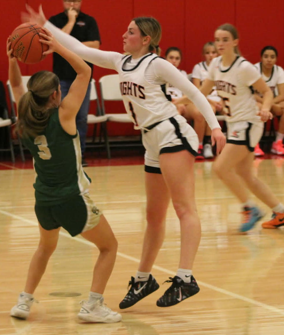 Lady Knights, Trojans win tourney openers post thumbnail image